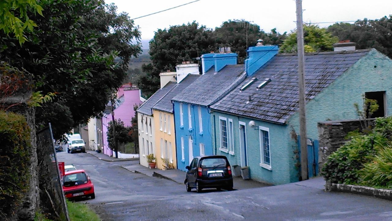 Colourful village houses street ballydehob mizen peninsula wildatlanticway ireland