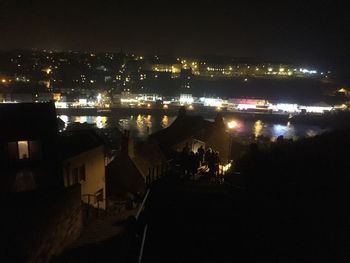 Illuminated cityscape at night