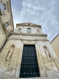 Low angle view of historic building against sky