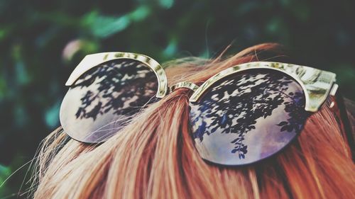 Close-up of sunglasses on head
