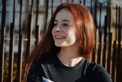 Portrait of smiling young woman