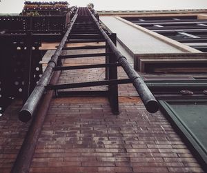 Low angle view of brick wall