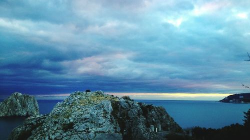 Scenic view of dramatic sky over mountain