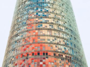 Low angle view of modern office building against sky