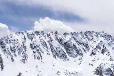 Landscape of snowy mountain peaks in india. mountains captured in snow great place for winter sports