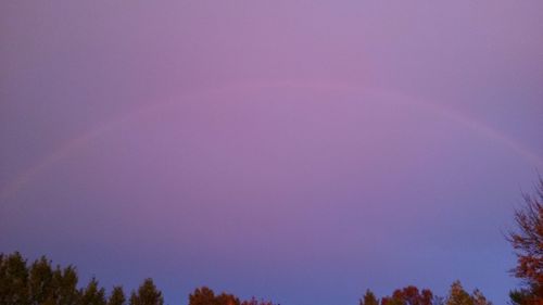 Low angle view of rainbow against sky