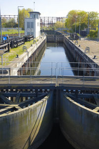 The modern large three mills lock on the river lee in london