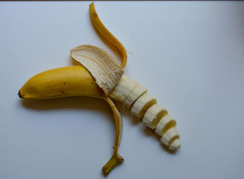 High angle view of bananas on white background