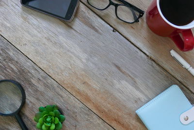 High angle view of coffee cup on table