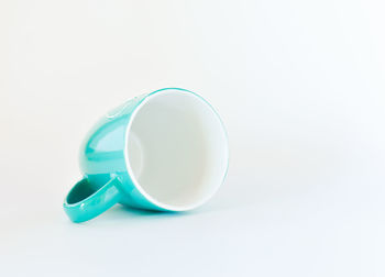 High angle view of empty coffee against white background