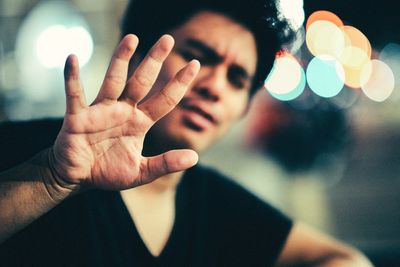 Young man gesturing