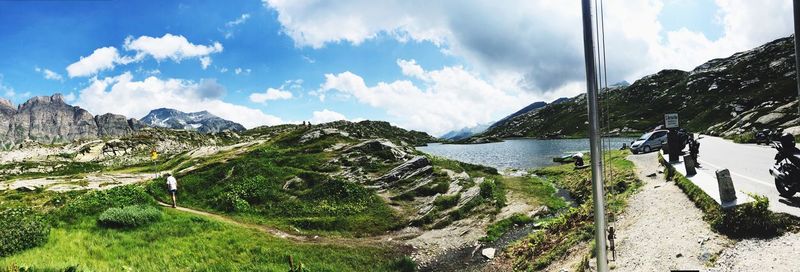 Panoramic view of land and mountains against sky