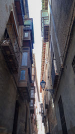 Low angle view of buildings against sky