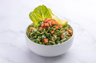 Close-up of salad in bowl on table