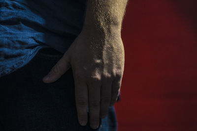 Low section of man legs on bed