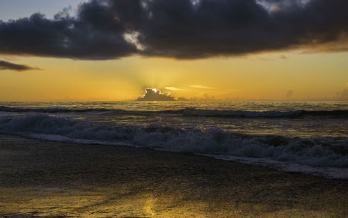 Scenic view of sea against sky during sunset