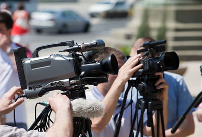 Close-up of man photographing