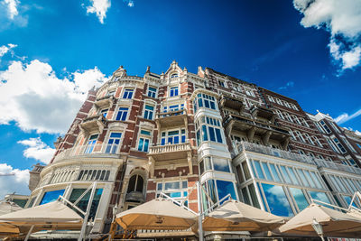 Low angle view of building against blue sky