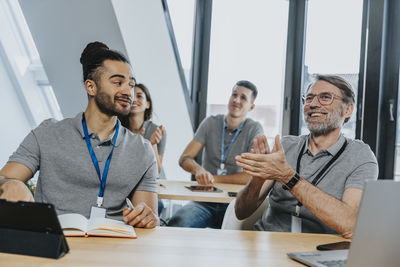 Group of people working on table