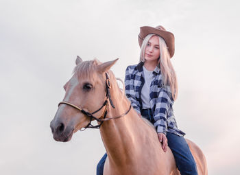 Young woman wearing hat