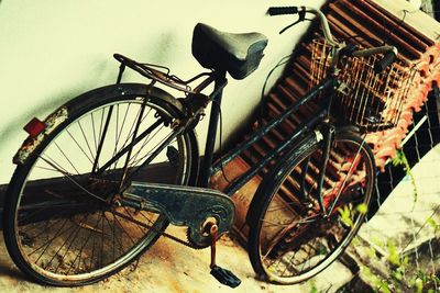Bicycle wheel in abandoned cart
