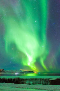 Scenic view of landscape against sky at night