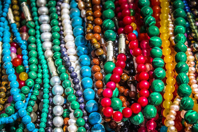 Close-up of multi colored jewelry for sale