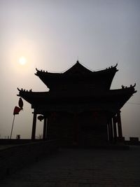 View of temple against sky during sunset