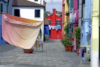 Alley amidst buildings in city