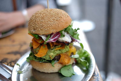 Close-up of burger in plate on table