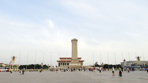 Group of people in front of historical building