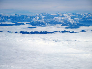 Scenic view of snow covered mountain against sky