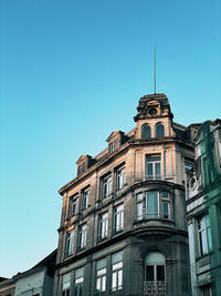 Low angle view of building in brussels against clear sky