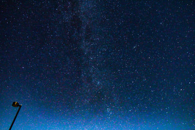 Low angle view of stars against star field at night