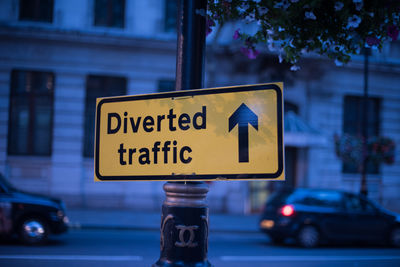 Information sign on road in city