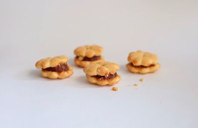 Close-up of cookies against white background