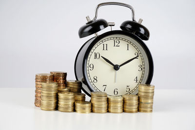 Clock tower against white background