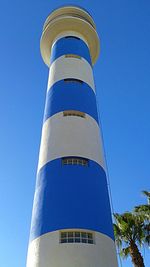 Low angle view of lighthouse against sky