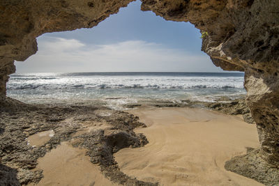 Scenic view of beach against sky