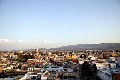 High angle shot of townscape against sky