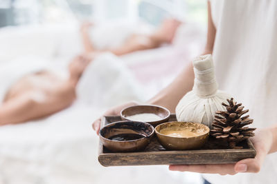 Close-up of hand holding ice cream