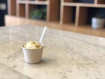 Close-up of ice cream on table