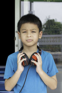 Portrait of boy standing