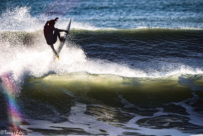 Man surfing in sea