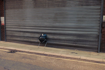 Chair on shutter door