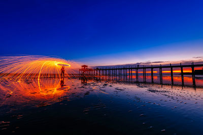 Scenic view of sea against sky at sunset