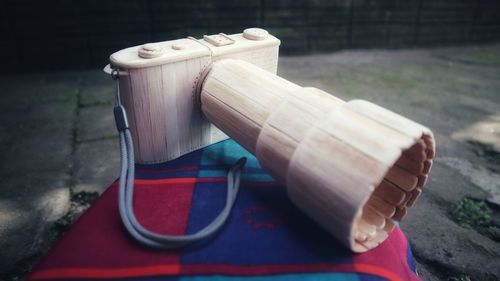 High angle view of toy on bench