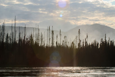 Scenic view of mountains against sky during sunset