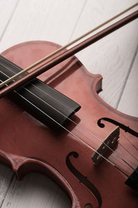 High angle view of guitar on table