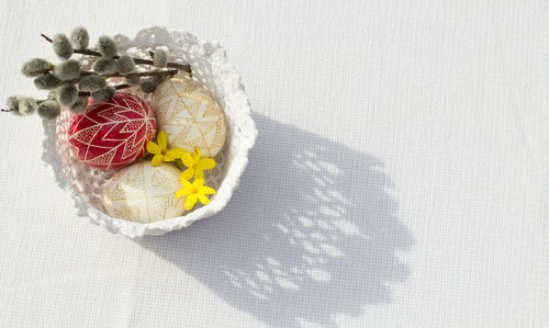 High angle view of easter eggs in bowl on table